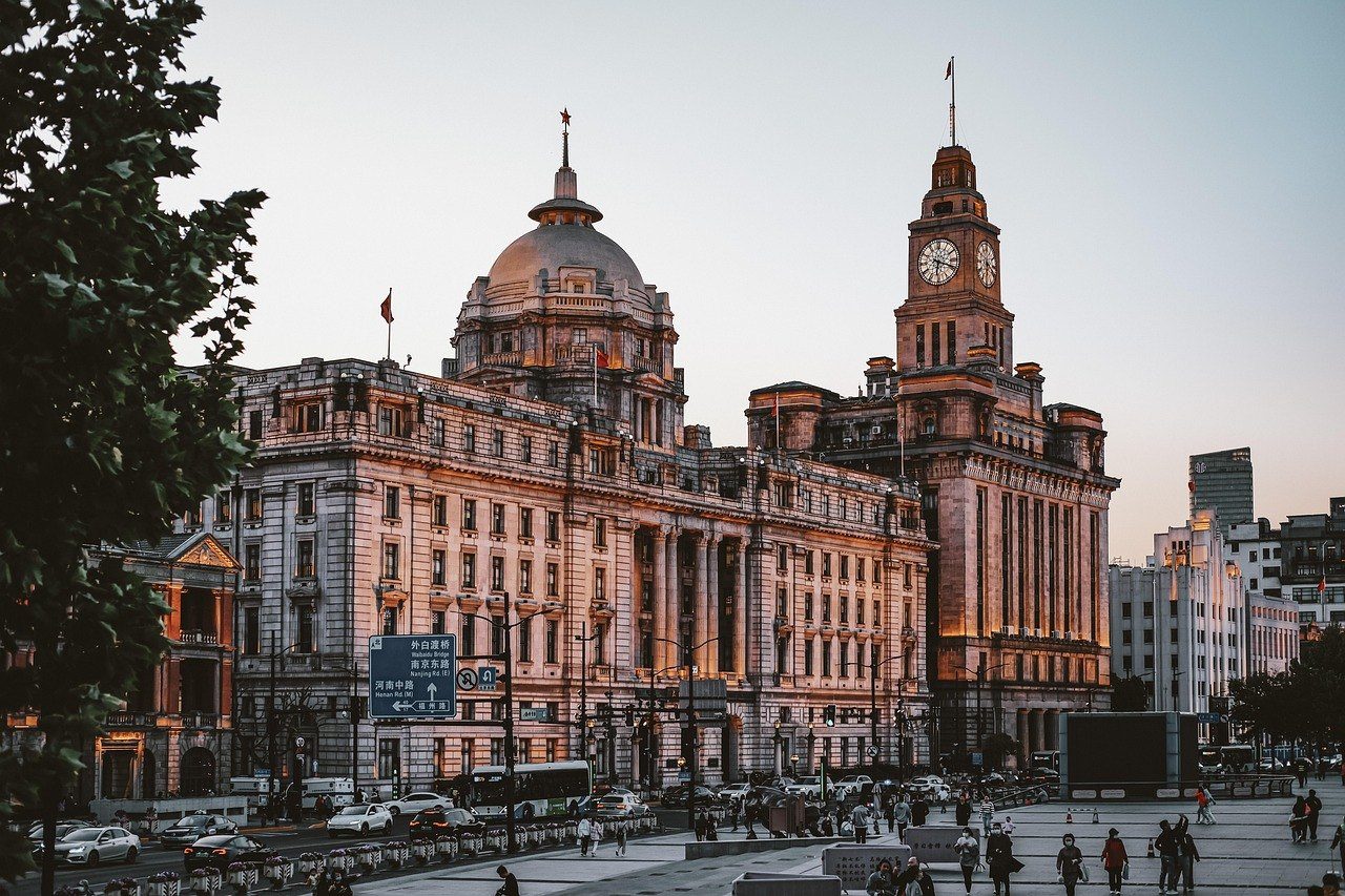 The Bund at the eastern end of Nanjing Road in Shanghai, where the city's main shopping district meets the Huangpu River — the area served by self-service tax-refund machines