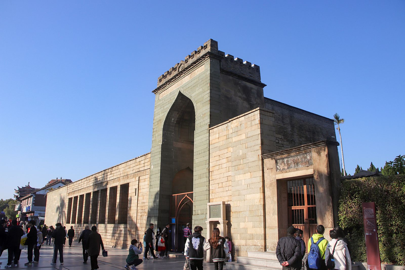 The stone gateway of Qingjing Mosque on Tumen Street in Quanzhou, built in 1009, with its pointed arch and Arabic inscriptions