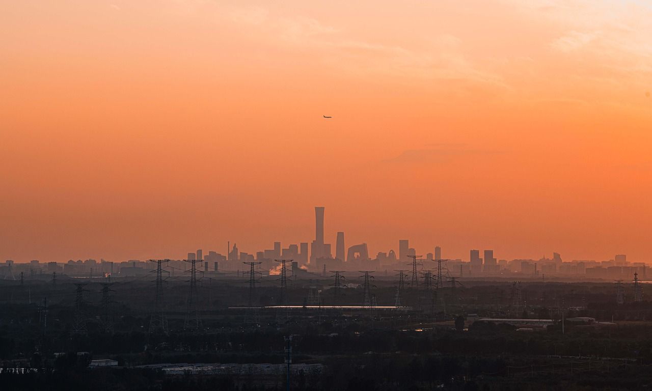 Evening light over Shougang Park's industrial landmarks