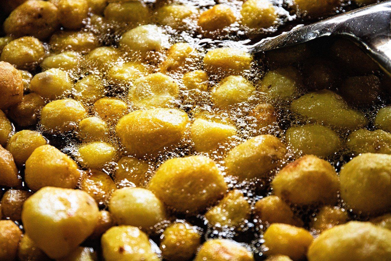 Potatoes frying at a street stall in Enshi, the rail gateway to Xuan'en